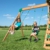 Backyard Discovery Spielturm Buckley Hill aus Holz | XXL Spielhaus für Kinder mit Rutsche, Schaukel und Kletterleiter | Stelzenhaus für den Garten - 8