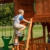 Backyard Discovery Spielturm Skyfort II aus Holz | XXL Spielhaus für Kinder mit Rutsche, Schaukel, Kletterwand und Aussichtsturm | Stelzenhaus für den Garten - 4