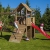 Fungoo Spielturm Carol 3 Kletterhaus mit Rutsche, Schaukel, Kletterwand und Rampe - Gelb - 2